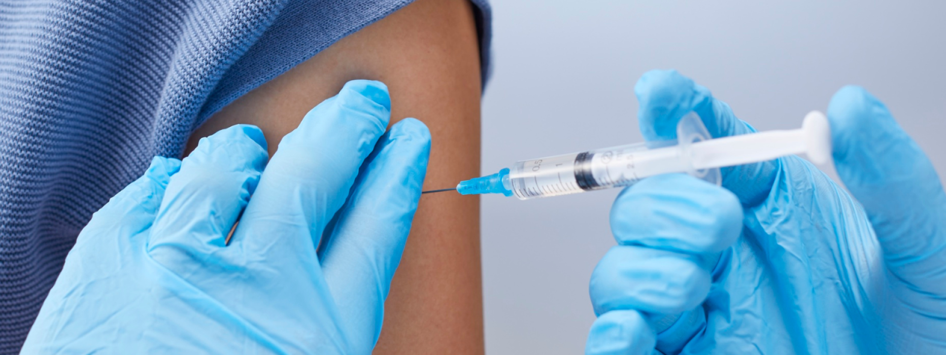 A patient receiving a vaccine.
