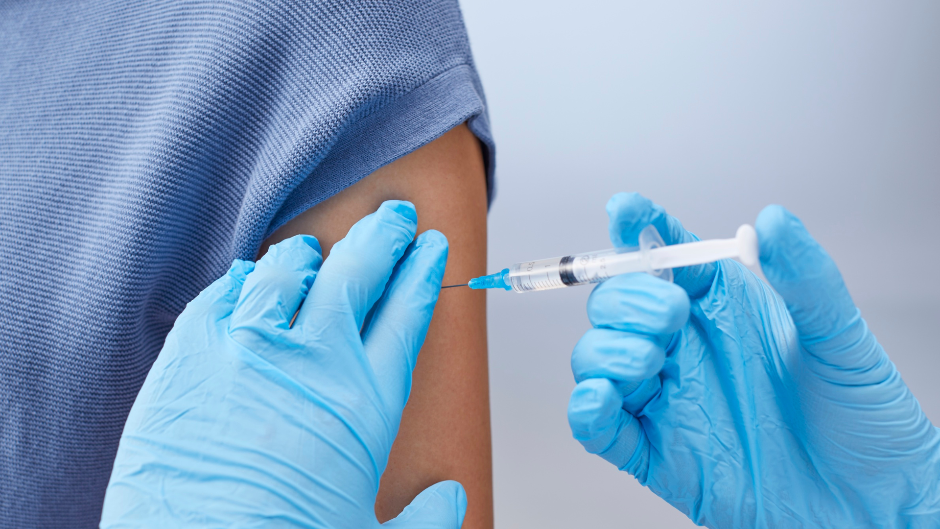 A patient receiving a vaccine.