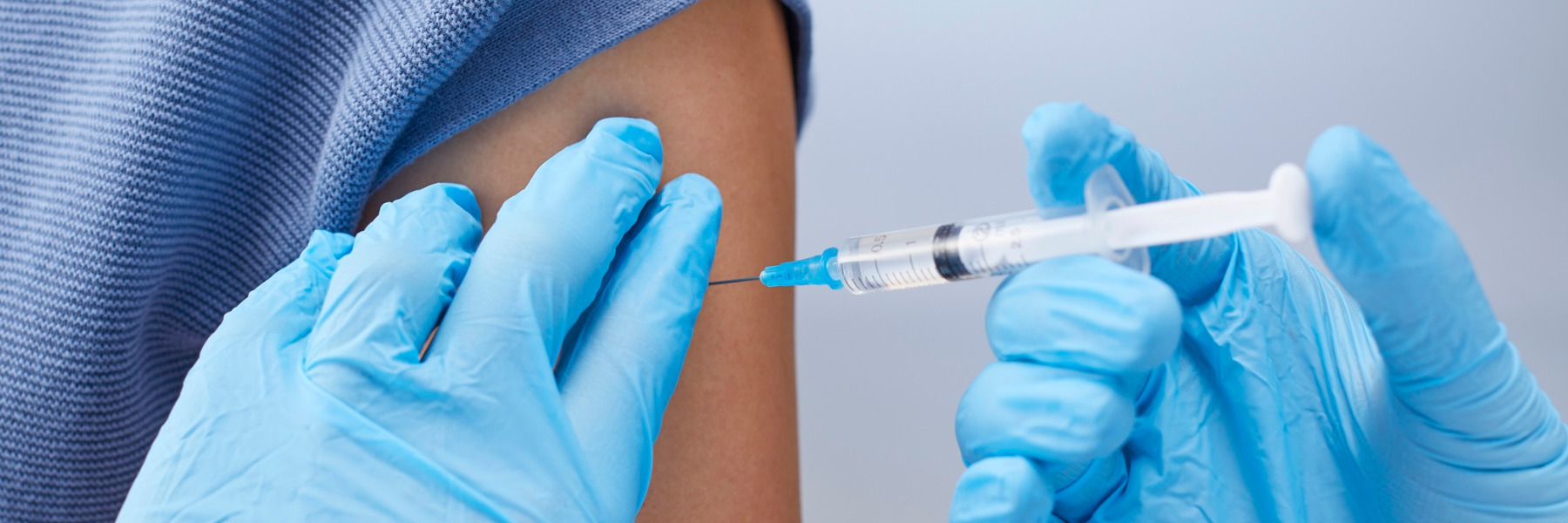 A patient receiving a vaccine.