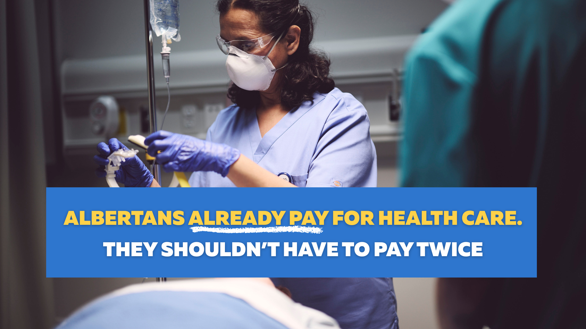An image of a respiratory therapist intubating a patiend, with text on the image that says "Albertans already pay for health care. They shouldn't have to pay twice."